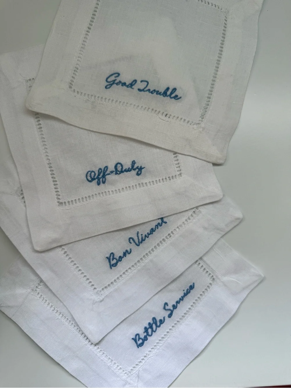 Embroidered White Linen Cocktail Napkins with Blue Script